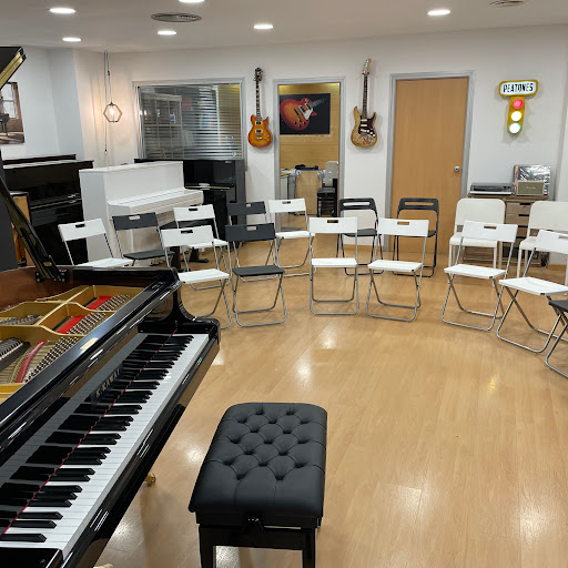 Quatre40: Tienda Pianos Barcelona